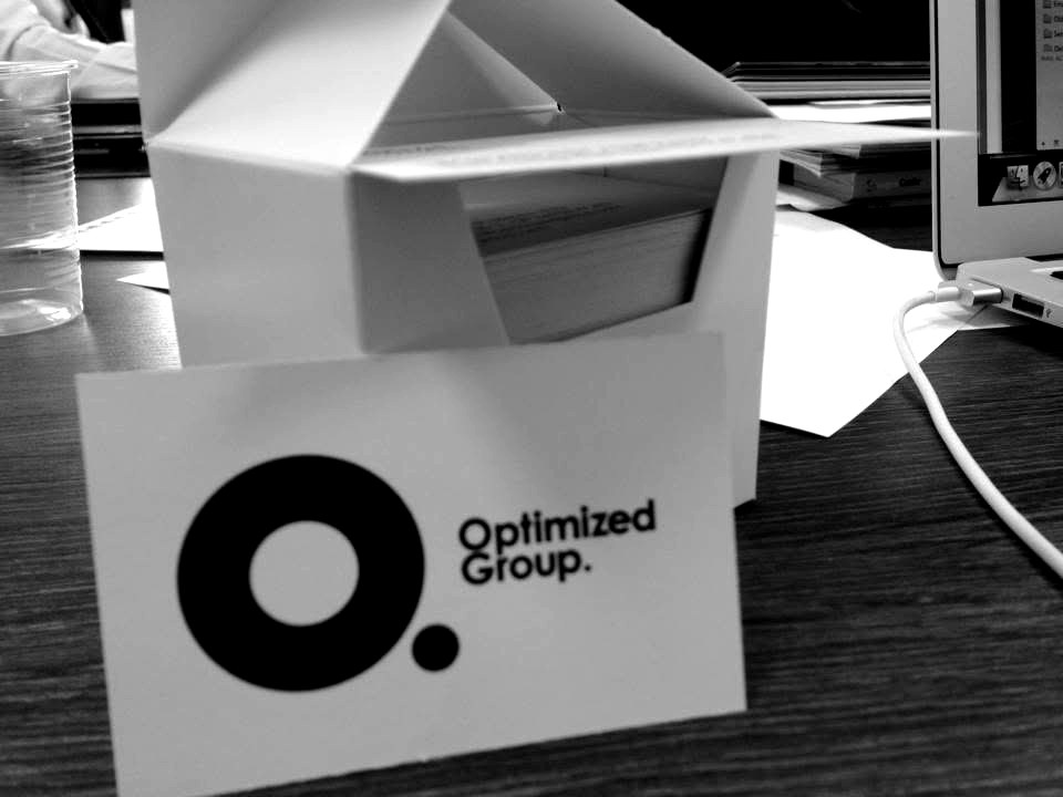 Optimized Group business card on a desk in Milan, the agency Niklas Lindahl founded
